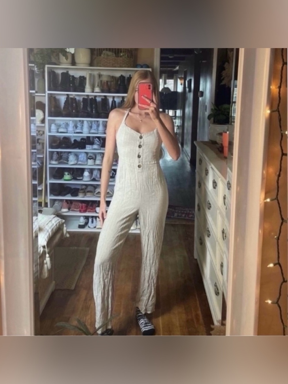 Romeo & juliet open back button up stripped jumpsuit in a size medium